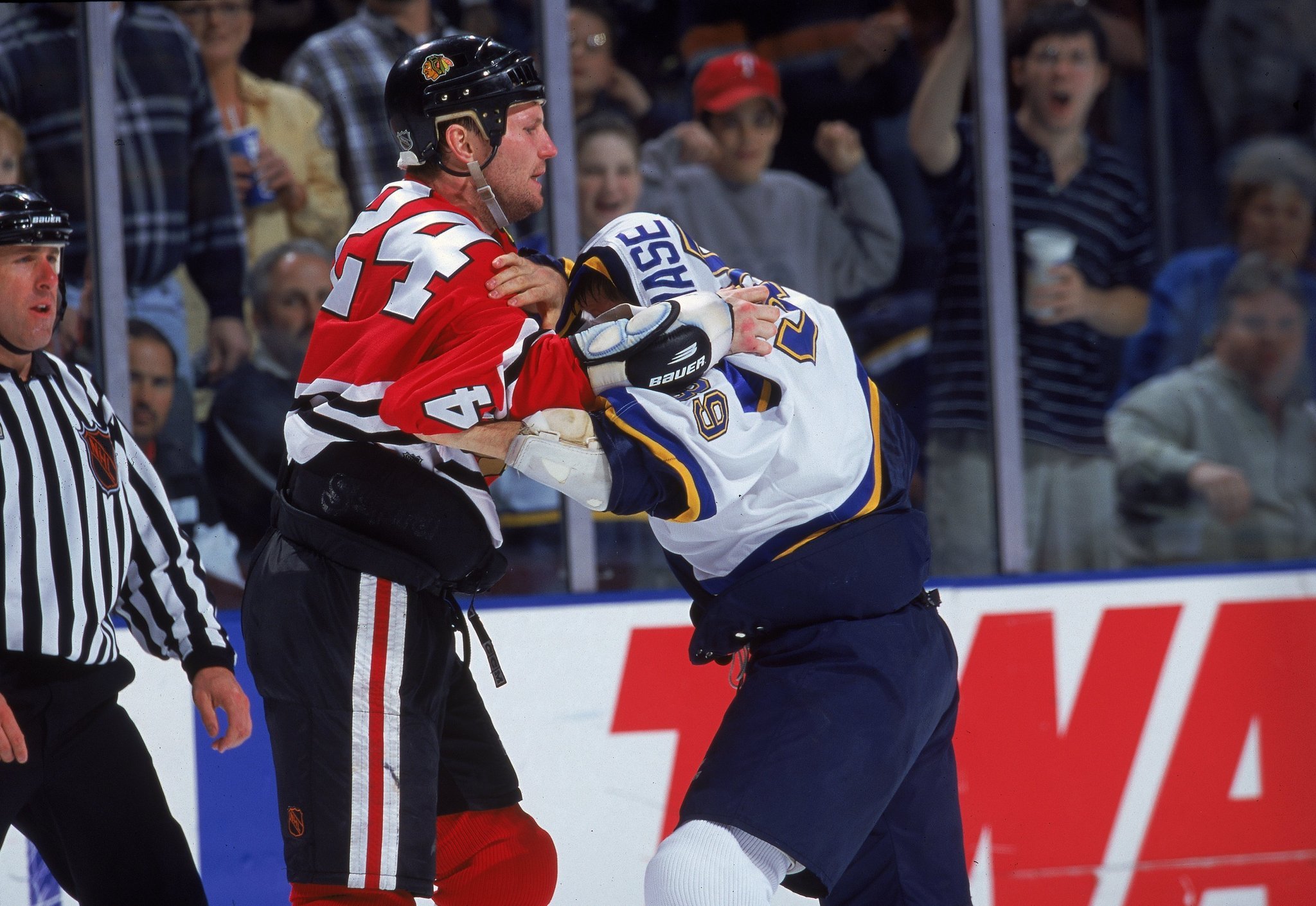 hockey fight jersey over head